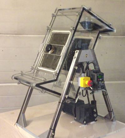 Rig for automated friction testing of fabric in wet conditions